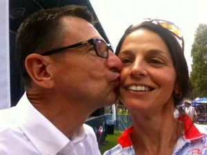 Snagging a Kiss from Renowned Cycling Commentator Paul Sherwin